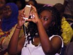 A mobile phone users seen at the Social Media Week Lagos