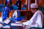 President Muhammadu Buhari seen in picture on desktop computer